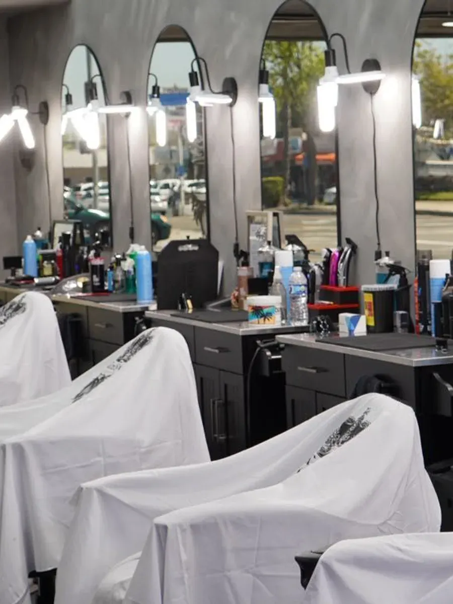Interior stations and chairs at Next Level Barbershop in Orange, California.
